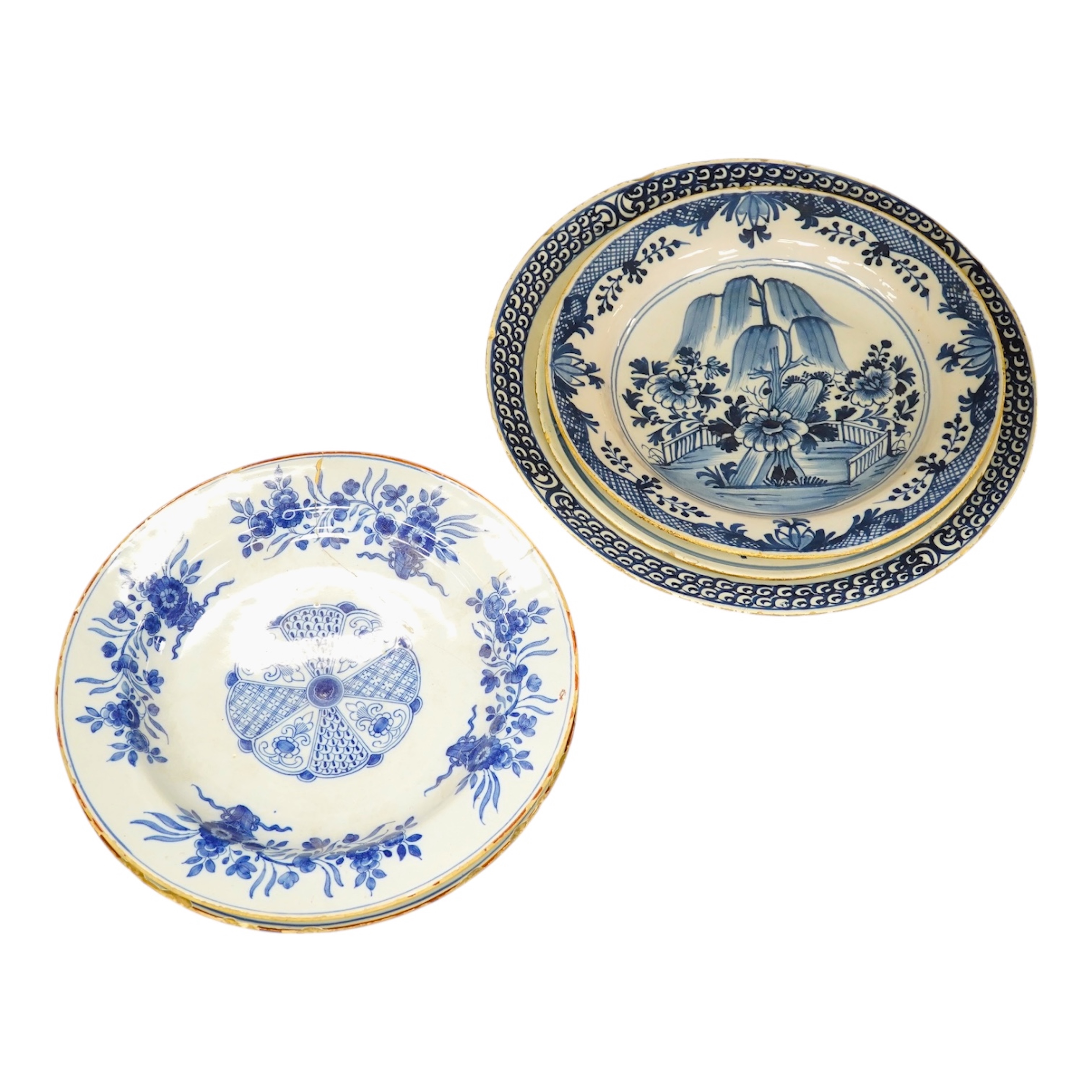 Three 18th century Delft pottery dishes, largest 31cm diameter. Condition - poor to fair